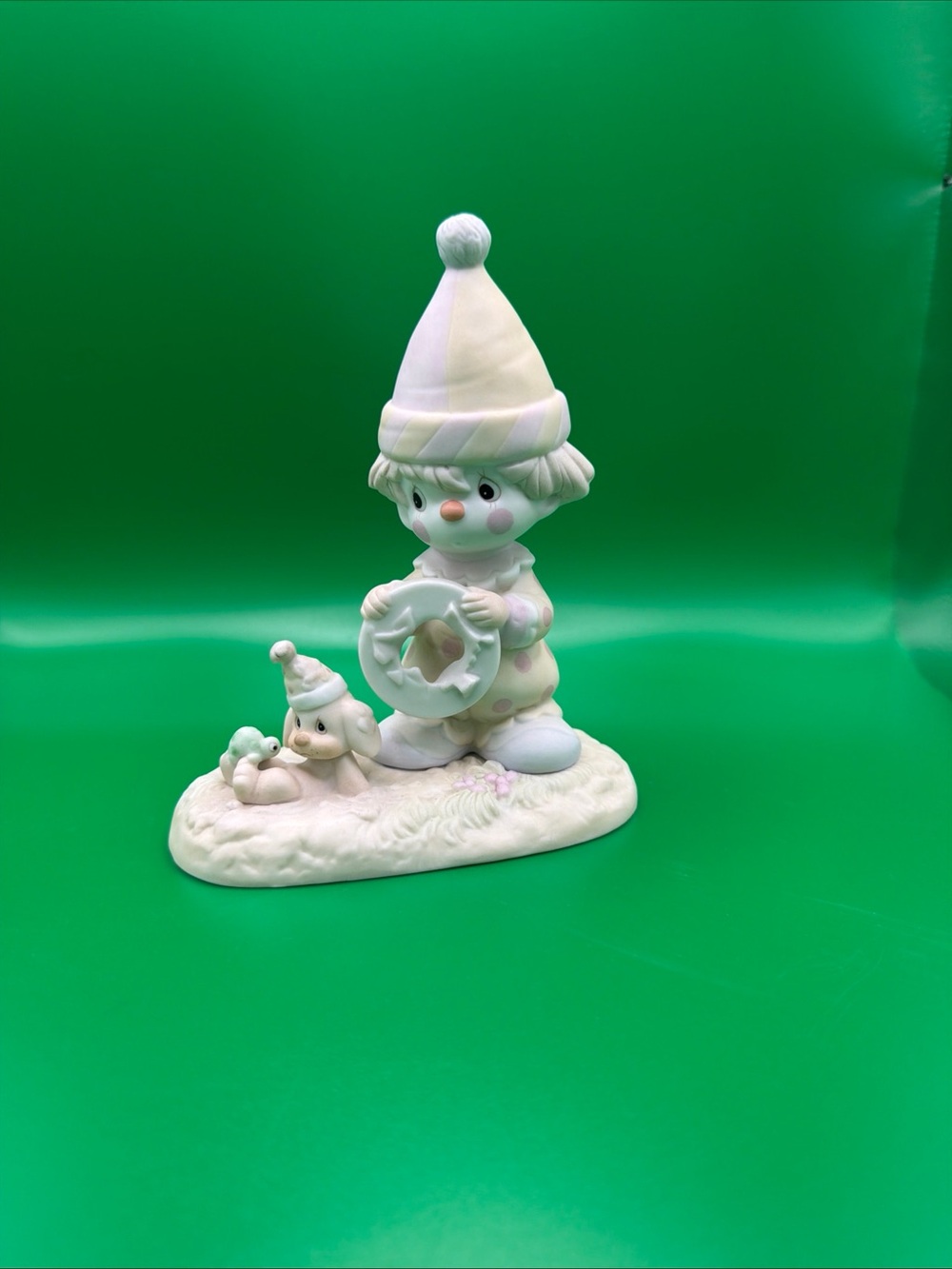 Precious Moments Cream Porcelain Figurine with Pastel Accents